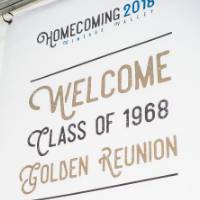 The banner that says "Welcome class of 1968, golden reunion" at the Alumni Homecoming Tailgate.